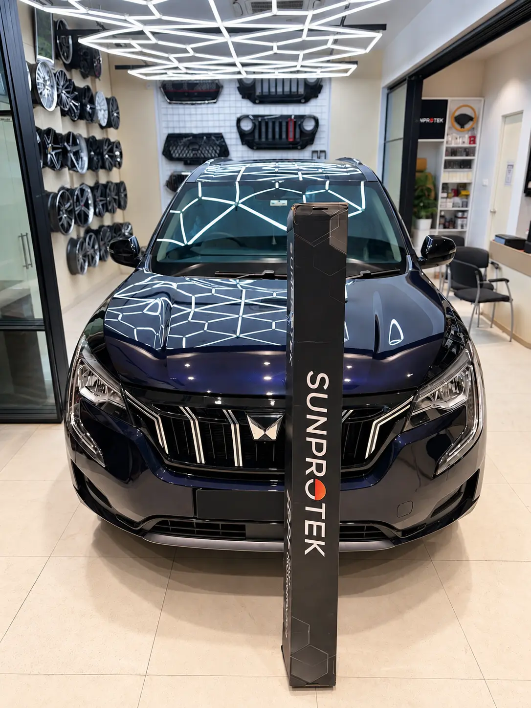 Front view of a Mahindra XUV 700 after SunProtek paint protection film fitting