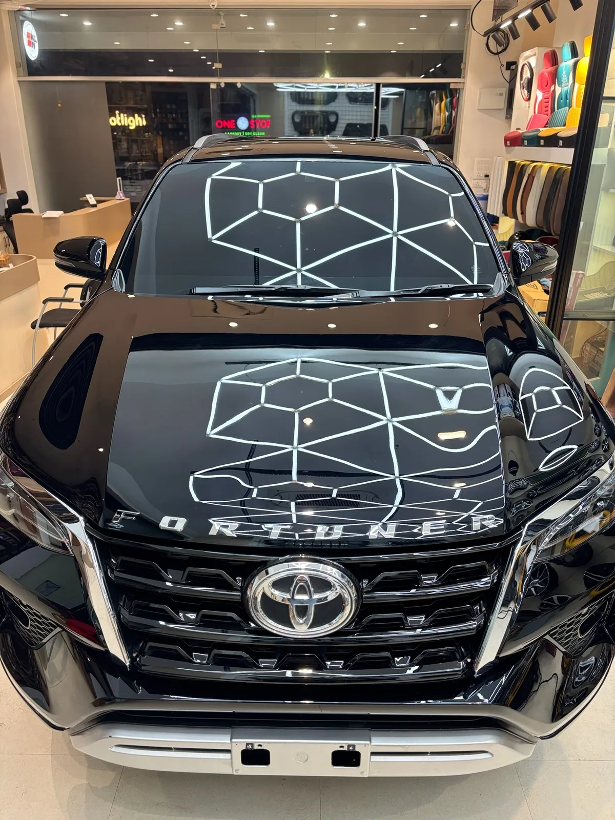 Close view of a Fortuner front bumper after film fitting