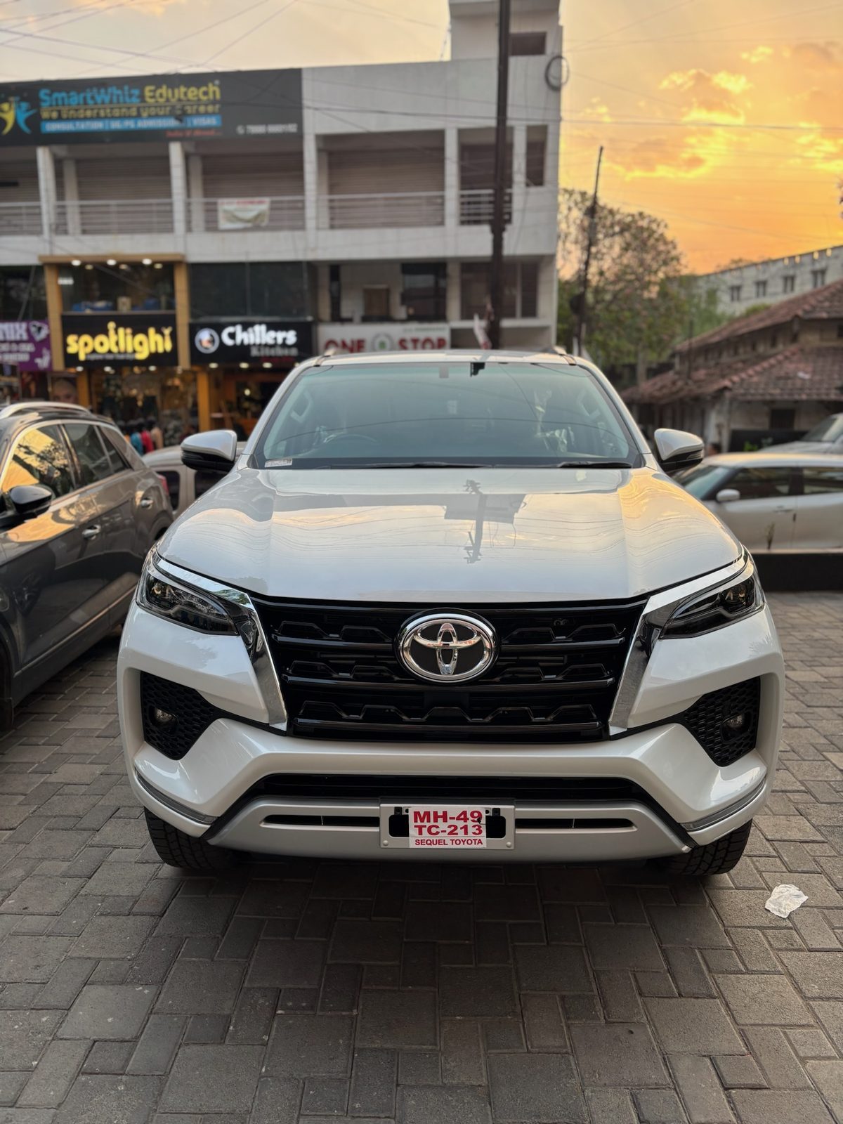 White Toyota Fortuner with paint protection film on the front panels