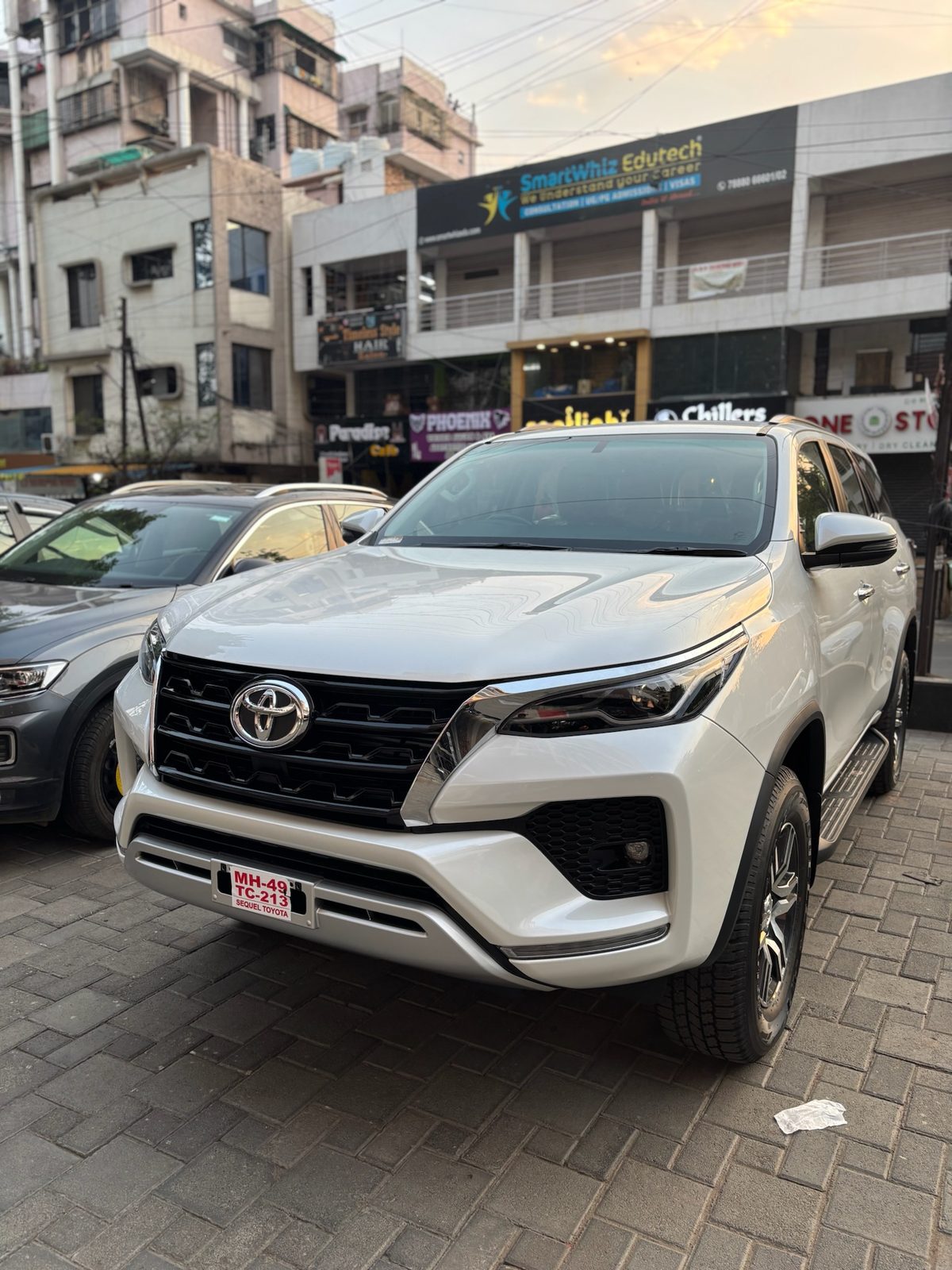 White Toyota Fortuner with paint protection film on the front panels